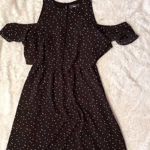 Selling a medium black and white Polkadot dress, midi length